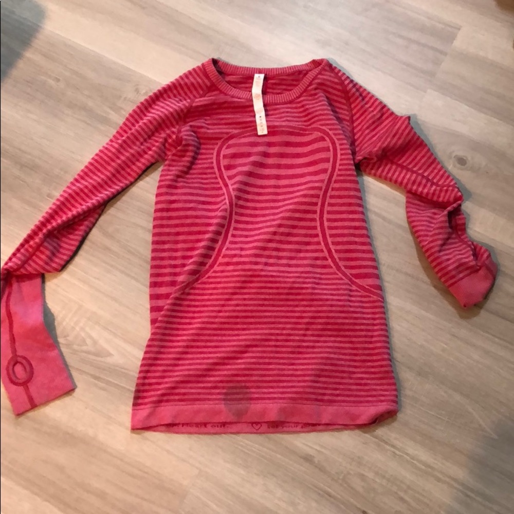 Lulu lemon top, hole in top shoulder and stain